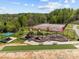 Community park featuring playground, tennis court, bocce ball, picnic area, and green space at 12614 Robert Walker Dr, Davidson, NC 28036