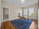 Dining room with hardwood floors, natural light, and space for entertaining at 12614 Robert Walker Dr, Davidson, NC 28036