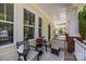 Relaxing front porch featuring comfortable seating and ample space for outdoor enjoyment at 12614 Robert Walker Dr, Davidson, NC 28036