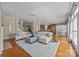 Open concept living room featuring hardwood floors, comfortable seating, and access to the kitchen at 12614 Robert Walker Dr, Davidson, NC 28036