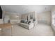 Spacious living room featuring neutral decor, carpet flooring and ample natural light at 12614 Robert Walker Dr, Davidson, NC 28036