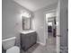 Bathroom showcasing the tile shower with glass door, as well as a tub with a window at 1315 Holshouser Rd, Rockwell, NC 28138