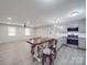 Stylish kitchen featuring granite countertops, stainless steel appliances, and a large island with seating at 1315 Holshouser Rd, Rockwell, NC 28138