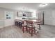 Eat-in kitchen featuring a breakfast bar, stainless steel appliances, and modern cabinetry at 1315 Holshouser Rd, Rockwell, NC 28138