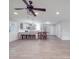 Open-concept living room and kitchen area with modern finishes, light gray cabinetry, and wood-look flooring at 1315 Holshouser Rd, Rockwell, NC 28138