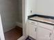 Modern bathroom with glass-enclosed shower, tiled walls, and stylish white vanity at 13304 Chopin Ridge Dr, Huntersville, NC 28078