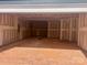 Spacious two car garage with unfinished walls, concrete flooring, and plenty of potential at 13304 Chopin Ridge Dr, Huntersville, NC 28078