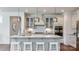 Bright kitchen features a large island with seating, stainless steel appliances, and pendant lighting at 13304 Chopin Ridge Dr, Huntersville, NC 28078