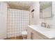 Updated bathroom featuring a new vanity, flooring, and shower with curtain at 1331 Mccorkle Rd, Charlotte, NC 28214