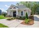 Charming clubhouse with stone accents, well-manicured landscaping, and convenient bike rack at 1347 Mifflin Ln, Dallas, NC 28034
