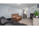 Bright living room with a fireplace, comfortable furniture, and open layout at 1347 Mifflin Ln, Dallas, NC 28034