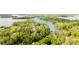 Breathtaking aerial view featuring waterfront property and surrounding greenery at 143 Ross Rd, Mooresville, NC 28117