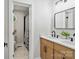 Elegant bathroom with double vanity, marble countertops, and a sleek glass-enclosed shower for a luxurious feel at 143 Ross Rd, Mooresville, NC 28117