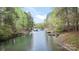 Picturesque waterfront view with private dock and serene lake setting at 143 Ross Rd, Mooresville, NC 28117