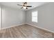 Bedroom features wood-look flooring and a modern ceiling fan at 15 Wright St, Rock Hill, SC 29730