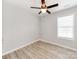 Bedroom featuring wood-look flooring, white trim, and ceiling fan at 15 Wright St, Rock Hill, SC 29730