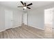 Bedroom featuring wood-look flooring, white trim, and ceiling fan at 15 Wright St, Rock Hill, SC 29730