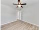 Bedroom featuring wood-look flooring, white trim, and ceiling fan at 15 Wright St, Rock Hill, SC 29730