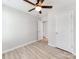 Bedroom featuring wood-look flooring, white trim, and ceiling fan at 15 Wright St, Rock Hill, SC 29730