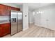 Bright kitchen featuring stainless steel refrigerator and wooden cabinets at 15 Wright St, Rock Hill, SC 29730