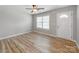 Light-filled living room featuring modern flooring, a ceiling fan, and a neutral color palette at 15 Wright St, Rock Hill, SC 29730