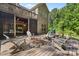 Spacious back deck with a cozy fire pit and comfortable seating perfect for outdoor gatherings at 15210 Pavilion Valley Cir, Huntersville, NC 28078