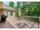 Expansive back porch with wood railings, offering space for grilling and outdoor dining at 15210 Pavilion Valley Cir, Huntersville, NC 28078
