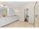Bathroom featuring double sinks, granite countertops, and a glass shower door at 15210 Pavilion Valley Cir, Huntersville, NC 28078