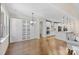 Open kitchen and living area featuring built-in cabinets and shelving with modern appliances and countertops at 15210 Pavilion Valley Cir, Huntersville, NC 28078