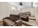 A finished basement theater room with leather recliners and recessed lighting at 15210 Pavilion Valley Cir, Huntersville, NC 28078
