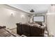 A finished basement theater room with leather recliners, a projector, and a screen at 15210 Pavilion Valley Cir, Huntersville, NC 28078