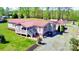 Aerial of the home highlighting the front porch and red-accented shutters at 161 Hickory Nut Dr, Statesville, NC 28677