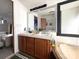 Bathroom with dual sinks, large mirrors, and a tub at 161 Hickory Nut Dr, Statesville, NC 28677