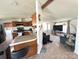Spacious kitchen open to the living area with tiled flooring throughout at 161 Hickory Nut Dr, Statesville, NC 28677
