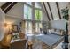 Bright living room features high ceilings, many windows, hardwood floors, and open concept floorplan at 1680 Ne 17Th Avenue Ct, Hickory, NC 28601