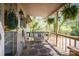 Charming covered porch with comfortable seating and views of lush greenery at 1680 Ne 17Th Avenue Ct, Hickory, NC 28601