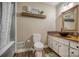 Bathroom with wood-look floors, wood vanity and unique vessel sink at 1680 Ne 17Th Avenue Ct, Hickory, NC 28601