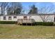View of the covered front porch that leads to the entrance of the house at 189 Woodwinds Dr, Mooresville, NC 28115