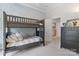 Shared bunk room with blue fish wallpaper and a sleek gray bunk bed at 1921 Brandon Cir, Charlotte, NC 28211