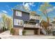 Charming multi-story home featuring a private balcony, ground level patio, and access to garage parking at 1921 Brandon Cir, Charlotte, NC 28211