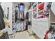 Well-organized walk-in closet with ample storage, shelving, and hanging space at 1921 Brandon Cir, Charlotte, NC 28211