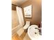 Cozy bathroom with shower-tub combo, vanity sink, and built-in storage at 207 Morris St, Kings Mountain, NC 28086