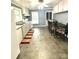 Eat-in kitchen featuring ample countertop space and a dining area at 207 Morris St, Kings Mountain, NC 28086