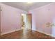 Bedroom featuring hardwood floors and a connecting bath at 2106 A Ave, Charlotte, NC 28216