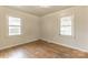 Bright bedroom with hardwood floors and natural light at 2106 A Ave, Charlotte, NC 28216