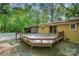Large wooden deck is perfect for entertaining and outdoor relaxation at 2415 Hargette Rd, Monroe, NC 28112