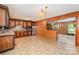 Spacious kitchen with wood cabinets and stainless steel refrigerator at 2415 Hargette Rd, Monroe, NC 28112