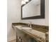 Bathroom featuring granite countertop and black framed mirror at 2528 Arnold Dr, Charlotte, NC 28205