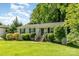 Beautiful one-story home with a well-maintained lawn and mature trees at 2528 Arnold Dr, Charlotte, NC 28205
