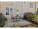 Landscaped patio with outdoor furniture for relaxing, offering a serene outdoor space at 2638 Dilworth Heights Ln, Charlotte, NC 28209